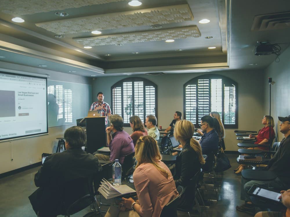 Choosing an LMS managed service vs building in-house — context